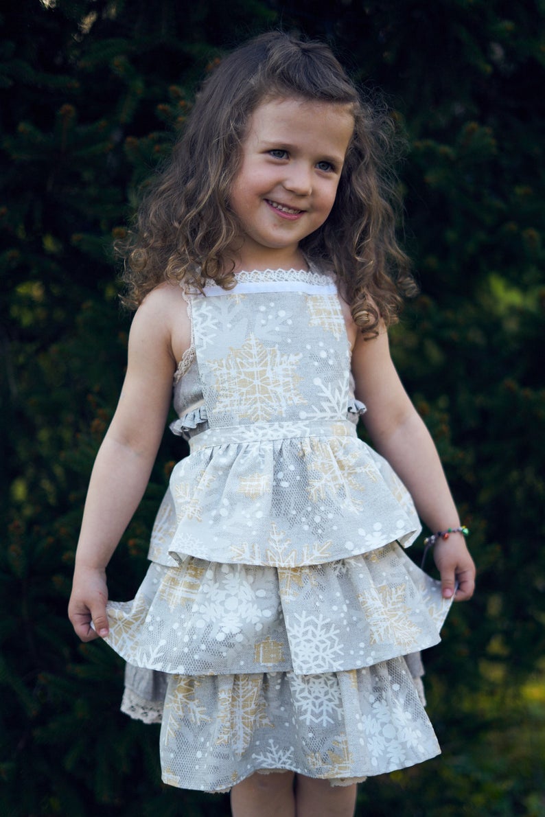 Winter motive kids apron with snowflake print, Cottom-Poly mix | TeaLurex Oro
